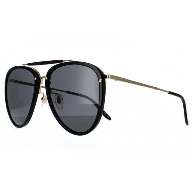 Gucci Aviator Mens Shiny Black and Gold Grey Sunglasses Gucci are a feminine aviator style crafted from lightweight acetate with contrasting metal details. Teardrop shaped polyamide lenses are framed in plastic, with a distinctive top bar, metal bridge and adjustable nose pads. Super slim metal temples are finished with a Gucci logo engraving..