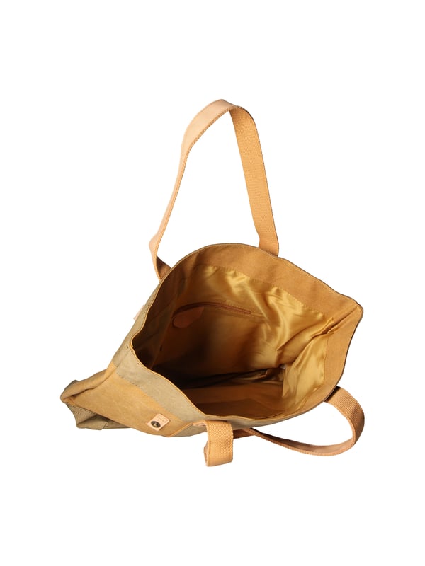 Bolso de mano de mujer de un compartimento en lona y piel genuina. Producto artesanal