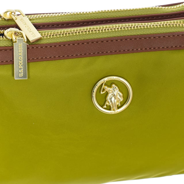 Crossbody bag U.S. POLO ASSN.
 Synthetic.
 Three compartments: two with zipper closure and one with magnet closure.
 Front interior: Two open pockets.
 Back interior: One zipper pocket.
 Adjustable removable strap.
 Interior lining with brand print.
 Brand logo on the front.
 Seams seen in tone.
 Measures: 25x17x3cm
 Composition: 70% Nylon, 30% Polyurethane
 Care:
Clean with a wet cloth.