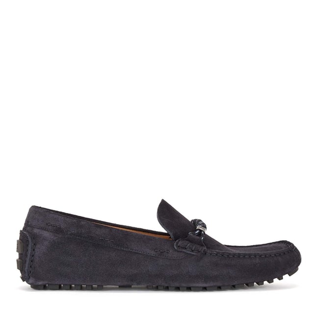 Men's Boss Driver Moccasin Shoes in Dark Blue Mens BOSS Driver Moccasin Shoes in dark blue.- Made in Italy.- Full suede upper design for a casual look.- Trimmed with seasonal chord hardware on the vamp. - Rubberised injected outsole and a cognac-leather lining delivers elevated comfort in every step.- Ref: 50472511-401