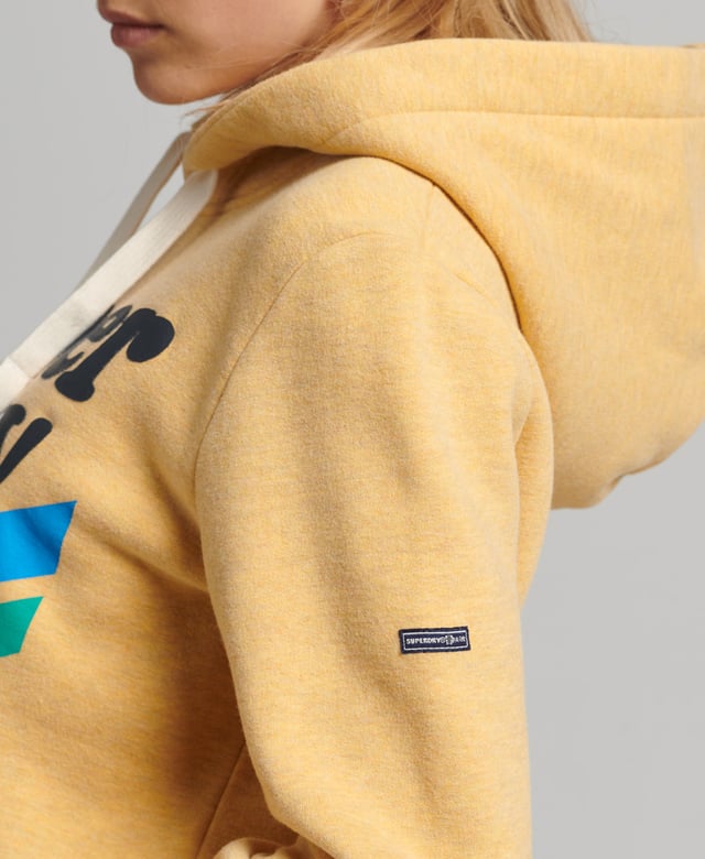Superdry Vintage Cooper Nostalgia Hoodie Our Vintage Cooper Nostalgia Hoodie brings a playful nature to your wardrobe. Retro-inspired graphics pay a loving homage to iconic designs, and effortlessly turn your casual out into a statement. With brushed lining and ribbed trims, these hoodies embody that trusted Superdry quality and are sure to keep you cosy.Relaxed fit – the classic Superdry fit. Not too slim, not too loose, just right. Go for your normal sizeDrawstring hoodLarge front pocketRibbed cuffs and hemBrushed liningSuperdry patch