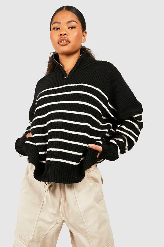 Half-zip neckline for adjustable coverage
        Bold striped pattern for eye-catching style
        Relaxed, oversized fit for ultimate comfort
        Ribbed cuffs and hem for a snug finish
        Versatile design suitable for various casual occasions
    
    Make a statement in this striking striped jumper, perfect for the fashion-forward petite woman. The half-zip neckline adds a sporty touch while allowing you to customise your look. Its relaxed, oversized silhouette offers both style and comfort, ideal for those laid-back days when you want to look effortlessly chic. Pair it with wide-leg trousers and trainers for a trendy casual ensemble, or throw it over a midi skirt and ankle boots for a more put-together look. Whether you're meeting friends for coffee or heading to a family gathering, this jumper is your go-to piece for versatile, on-trend style. The bold stripes and cosy knit fabric make it a standout item in your wardrobe, ready to take you from season to season with ease.