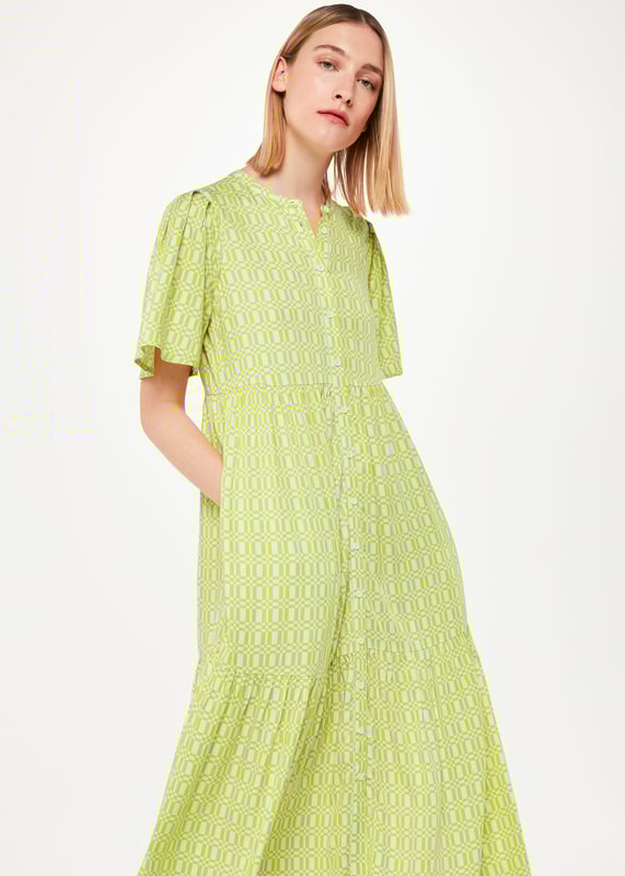 Elevate your style with our Link Trapeze Dress, perfect for any casual setting with its comfortable fit and vibrant pattern.