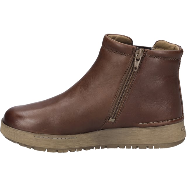Discover the essence of cosiness and sustainable fashion with the Anna 04 ankle boot in castagne by JOSEF SEIBEL. A pair of shoes specially designed for women to enjoy everyday life to the full. This model exudes traditional charm and modern design with its smooth goatskin leather, a warm textile lining and a Rubflex sole, which is known for its flexibility, pliability and durability. The Anna 04 is more than just an ankle boot; it is a statement for those who prioritise comfort without compromising on style and quality. Equipped with a practical zip fastening, they offer easy entry and a perfect fit for wider feet thanks to the comfortable width H. The removable insole allows you to insert your own orthopaedic footbed, making them even more comfortable to wear. The upper is joined to the outer midsole combination using the traditional Strobel technique, which gives the shoe a special stability and makes it ideal for outdoor activities. Whether for walks in the countryside, on the way to work or meeting up with friends, the Anna 04 ankle boot is the perfect companion for every occasion. With its classic yet strong character and membership of the Spirit of Nature product line, it embodies the JOSEF SEIBEL philosophy: style paired with exceptional comfort and a strong commitment to slow fashion, far removed from the fast pace of the fashion industry. This shoe is a tribute to the craftsmanship and heritage of JOSEF SEIBEL, designed to stand the test of time while remaining comfortable and stylish.