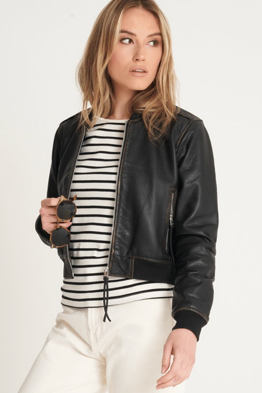Introducing the Barneys Originals Washed Cropped Bomber Jacket – a fusion of contemporary style and timeless appeal. Crafted with textured leather, this jacket not only adds an edgy dimension but also offers a unique tactile experience. The cropped design adds a modern twist to the classic bomber silhouette, making it a versatile choice for any occasion. The washed finish lends a vintage charm, ensuring that each piece is distinctively yours. Elevate your fashion game with this Barneys Originals jacket – where texture meets trendsetting in a cropped bomber masterpiece.