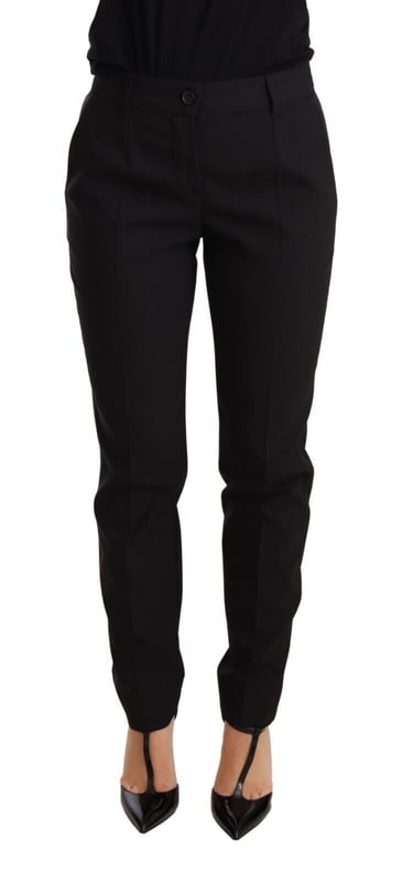 Marca: Dolce & Gabbana  
100% Auténtico  
Pantalones de cintura media  
Silueta ajustada  
Pliegues prensados  
Pantalones tapered  
Corte regular  
Material: 99% Lana Virgen 1% Elastano  
Color: Negro  
Cierre con cremallera y botón  
Detalles de logo  
Hecho en Italia  
Material: 99% Lana Virgen 1% Elastano