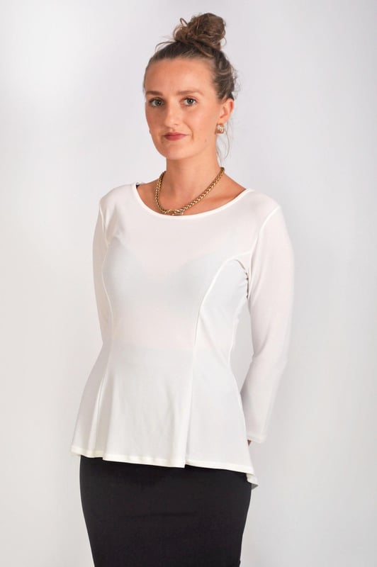 This peplum top is a simple way to work the peplum trend. In a stretchy material and with flattering 3/4 length sleeves, and dipped hem this top is comfortable and stylish

95% Polyester - 5% Elastane
Smooth Stretch Lightweight Jersey
Sizing: As expected
Length: Front 23" Back 26" Shoulder to Hem (Dipped Hem)
