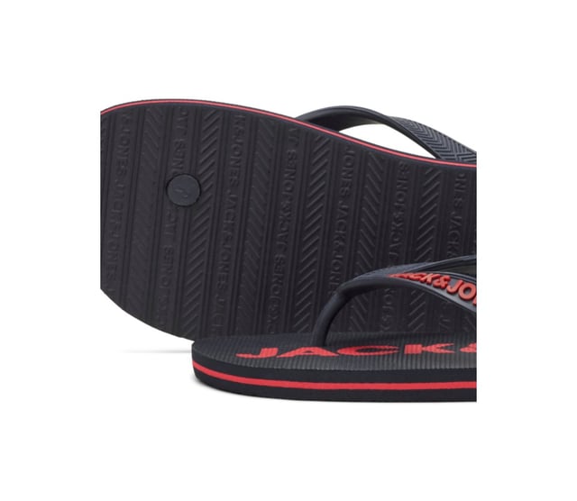 Slides Slip on Style with Round Toe

Jack & Jones Branding Name on Strap

Plain Solid Colour Slippers

Cushioned Foot Bed with Textured Branding Pattern and Rubber Flip Flop Sole

Highly Fashionable and an Ideal Present

Comfortable Inner Lining and Non-Slip Sole

Made of 100% Rubber
