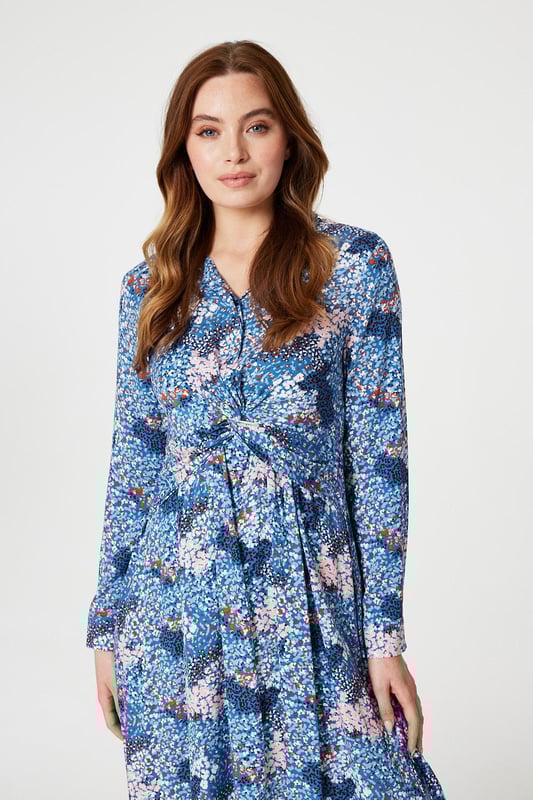 Refresh your daytime occasion wear collection with this printed midi dress. It has a classic collar with a v-neck, button front detail, a twist front embellishment, long sleeves with cuffs, a shirred back detail and a midi length skirt with a side split. Finish your look with elegant blush heels and an a neutral clutch bag.