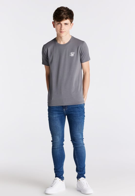 inchBoys Essential Midstone Skinny Denim JeanStretch DenimButton Waist with Belt LoopsTan Pu Patch With LogoMachine Wash98% Cotton 2% Elastane inch