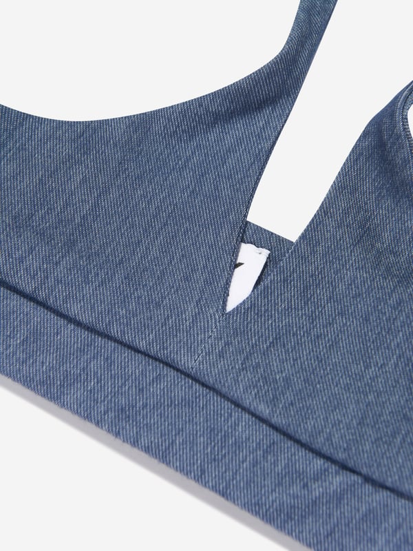 Take poolside cool to another level with this girls blue halterneck bikini set from AY by Ayla. The denim-style set leaves am impression when making a splash. An elasticated band across the hem and waistband ensures a comfortable fit for free and easy movement. 2 Piece Set Halterneck Tie Fastening Elasticated Trims