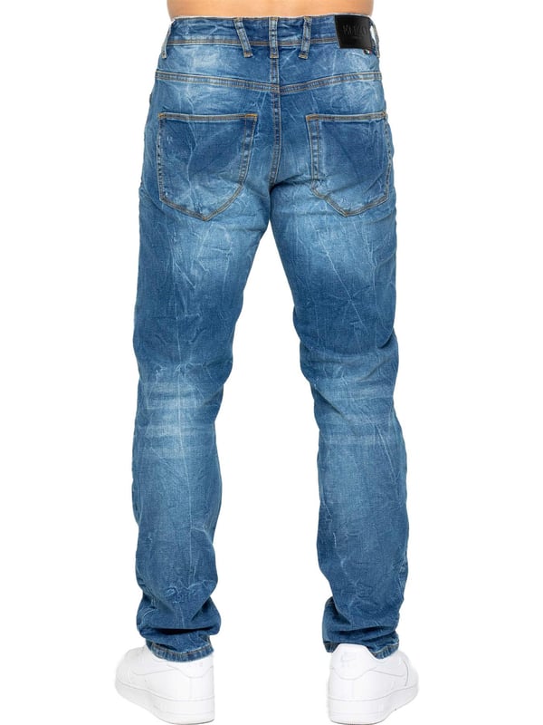 Mejora tu colección de denim con los Enzo Men's Distressed Ripped Jeans. Diseñados para el hombre moderno, estos jeans combinan estilo y comodidad con un corte clásico de pierna recta y un diseño versátil de 5 bolsillos. La tela elástica asegura un ajuste perfecto y máxima comodidad, permitiéndote moverte con facilidad durante todo el día. Con cierre de cremallera, detalles desgastados y un parche trasero de la marca, estos jeans añaden un toque rudo y elegante a tu atuendo. Perfectos para salidas casuales o una noche fuera, los Enzo Men's Distressed Ripped Jeans combinan estilo y funcionalidad sin esfuerzo.