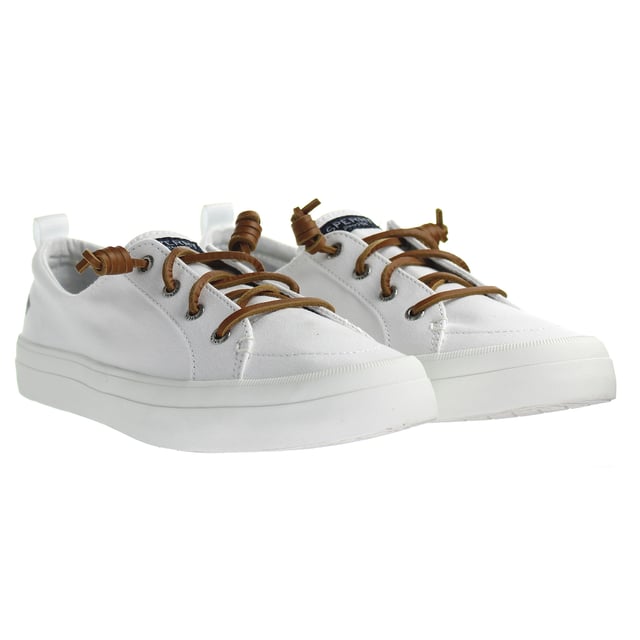Sperry Crest Vibe Women's White Plimsolls – the perfect fusion of timeless style, coastal inspiration, and everyday comfort. These plimsolls are designed to elevate your casual look while providing exceptional comfort for all-day wear.

Key Features:

 Classic Coastal Charm:  The Crest Vibe Women's White Plimsolls by Sperry capture the essence of coastal living with their classic yet modern design. Whether you're by the shore or exploring the city, these plimsolls exude a relaxed elegance that complements various outfits.

 Quality Craftsmanship:  Crafted by Sperry, a brand renowned for its nautical heritage, these plimsolls boast impeccable craftsmanship. The attention to detail in their design ensures durability and a lasting style that withstands the test of time.

 Day-Long Comfort:  Featuring a cushioned insole and a padded collar, these plimsolls provide exceptional comfort that lasts from morning till night. The cushioning supports your feet throughout your activities, making them ideal for both leisure and light adventures.

 Effortless Slip-On Style:  The convenient slip-on design of the Crest Vibe plimsolls ensures easy on-and-off wear. Whether you're in a rush or seeking a hassle-free footwear option, these plimsolls are your go-to choice.

 Versatile White Hue:  The pristine white color of these plimsolls offers versatility in pairing with a range of outfits. From casual dresses to jeans and shorts, these plimsolls effortlessly elevate your style, making them a wardrobe essential.

 Non-Marking Outsole:  The non-marking rubber outsole not only provides reliable traction but also ensures that you can wear these plimsolls indoors without leaving scuff marks. This feature adds to the versatility and practicality of the shoes.