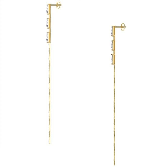 Do you like modern accessories with a touch of glamor that add star appeal to any of your outfits? Then these earrings from the Rafaela Donata label are the right choice. Inspired by the trendy waterfall design, a long chain strand dangles from the earlobe, decorated with faceted zirconia at the top. Minimalist and yet with small sparkling elements, the earrings score points with all fashionistas who like unusual but stylish jewelry. The earrings are made of 925 sterling silver and finished with 14 carat yellow gold. Plug-in fasteners ensure a high level of comfort and easy handling when putting on and taking off.