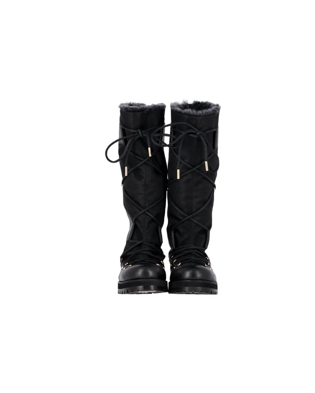 VINTAGE, RRP AS NEW
Conquer winter with the Jimmy Choo Rabbit Fur-Lined Snow Boots in Black Leather. Made from high-quality black leather, these boots offer a durable and stylish option for colder weather. The rabbit fur lining provides ultimate warmth and comfort, making them a cozy choice for even the coldest winter days. 

Jimmy Choo Rabbit Fur-Lined Snow Boots in Black Leather
Material: Leather
Color: Black 
Size: EU38.5
Condition: Excellent
Sign of Wear: No
SKU: 368262
