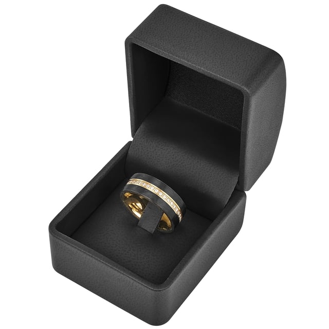 It is supposed to be something unique for your favorite person? Then we recommend this extravagant ring from the jewelry manufacturer Suror 1934. The ring made of polished stainless steel and carbon impresses with its extraordinary, striking design. This memorial ring focuses on the sparkling zirconia stones, which were refined by an elaborate brilliant cut. They glitter in a fairy tale in the smallest incidence of light. Underline your deep connection with this elegant piece of jewelry and set a sign that nobody overlooks everyday life. They both belong together forever! The ring is also a loving surprise for the lady of the heart for birthday or at Christmas!
