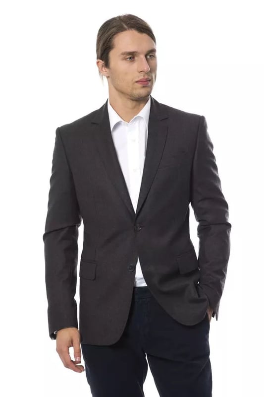 Gray Wool Blazer
  Single-breasted design
  Made from Quality wool
  Versatile gray color
  Suitable for formal occasions or everyday wear
Material: 100% Wool