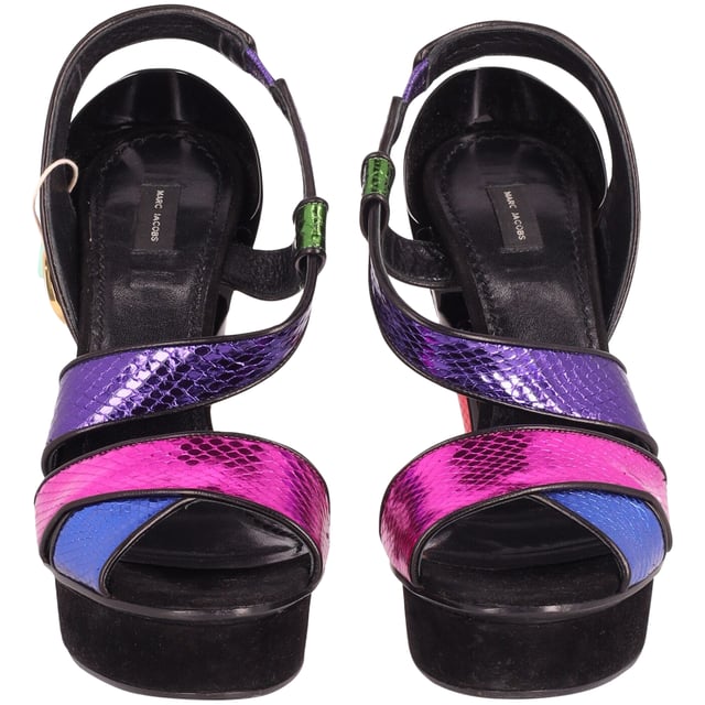 VINTAGE, RRP AS NEW
For your next party outing, adorn these Marc Jacobs sandals for a glamorous appearance. The  heels and platforms of this pair will effortlessly class up your looks. Created from snakeskin embossed multicolor leather, it features a colorful display and a slingback straps.

Marc Jacobs Color Block Heart Platform Heel Sandals in Multicolor Leather
Condition: Excellent 
Sign of wear: Fair lint on shoes: removable, some white marks on midsoles
Size:  EU 39/US 9
Color: Multicolor
Material: Leather
SKU: 161852