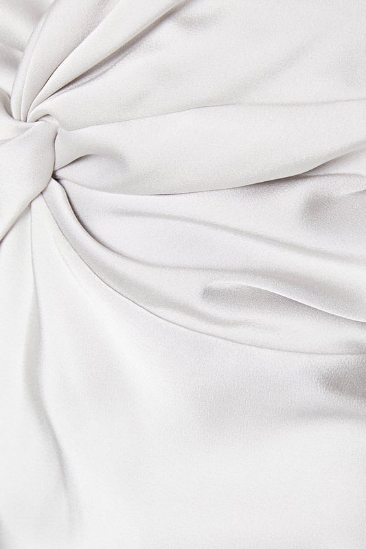 Made from satin, this elegant midi dress is not only stylish but also comfortable to wear. Whether you're attending a party or going out with friends, this dress will make you stand out. It's also a great option for bridesmaids, adding a touch of sophistication to any wedding.