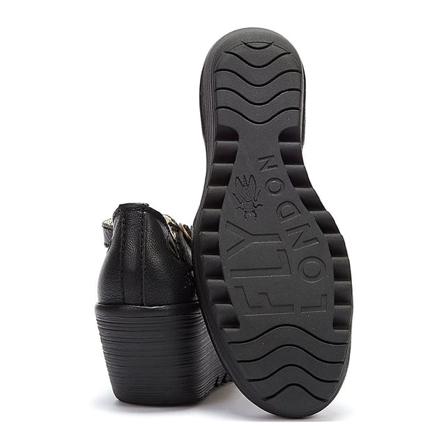 The Yuna from Fly London is a platform sandal with elevated heel. Features include premium materials, drop-shaped cut outs, and a round buckle fastening. Complete with signature Fly London branding.