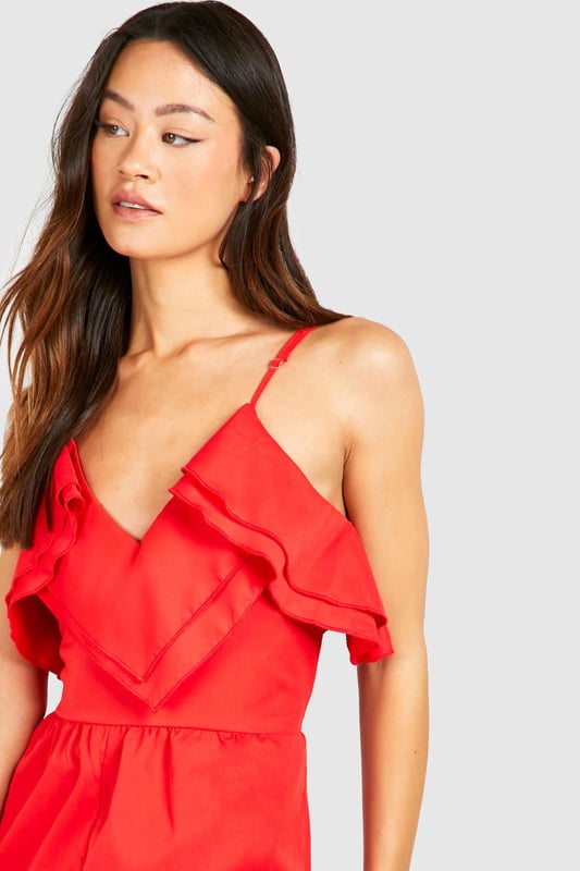 Cut those mornings in half with the help of a tall playsuit or jumpsuit from our latest arrivals. When the temperature rises, we've got playsuits for tall ladies, seen in fresh florals, ruffle sleeves and colourful prints. Take on the night in a tall jumpsuit, we're loving lace trims, plunging necklines and cut-out details. For all girls 5'7" and over, a long length jumpsuit for tall women is the effortless piece you need.Style: Wide Leg JumpsuitFabric: PolyesterLength: RegularNeckline: WrapSleeve Length: Strappy