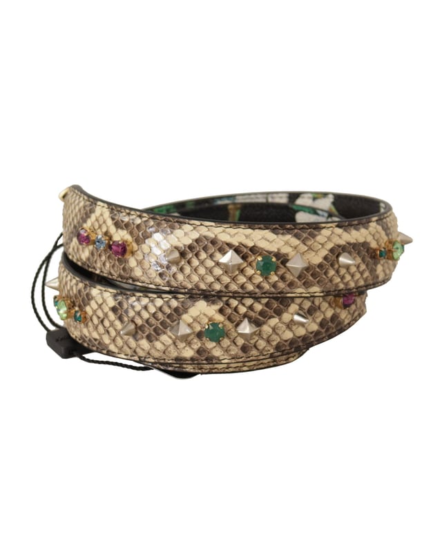 100% äkta Dolce \u0026 Gabbana axelrem för axelväska\n  Tillverkad av läder\n  Vacker beige nyans\n  Komplett med två guldfärgade karbinhakar\n  Modell: Axelrem för väskor\n  Kön: Kvinna Kvinnor\n  Färg: Beige med guldfärgade metalldetaljer\n  Material: 100% Python-läder\n  Detaljerad logotyp\n  Tillverkad i Italien\n  Mått: 100cm x 3cm\nMaterial: 100% pytonläder