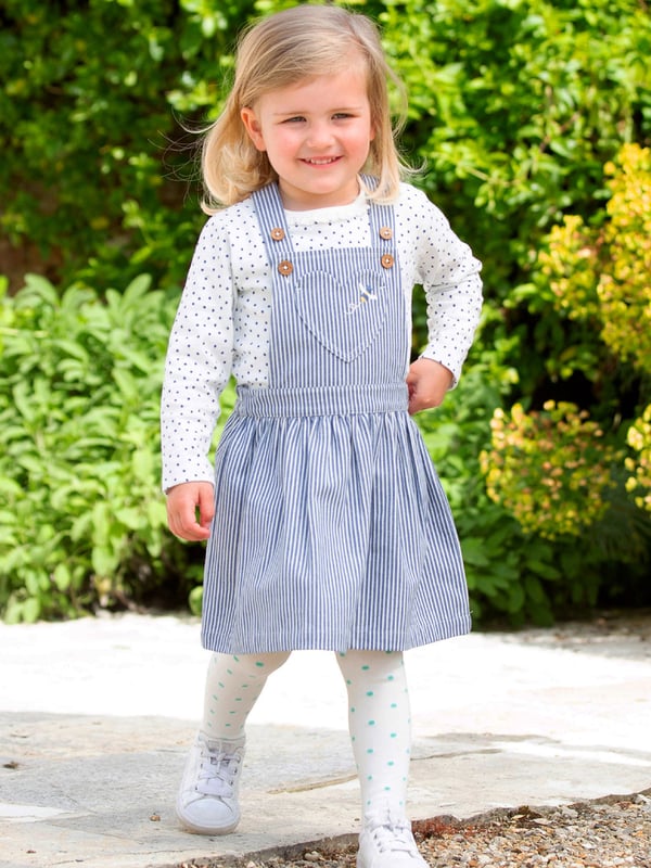 100% organic cotton | Proud to be certified to the Global Organic Textile Standard (GOTS) | Navy blue and cream ticking stripe | Bumble bee embroidery | Adjustable straps with coconut buttons | Front bib pocket | Elasticated waistband | Made in India | Machine washable at 40 degrees, or at 30 degrees to be kinder to the planet