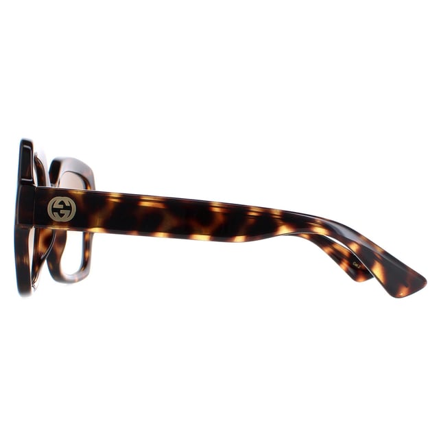 Gucci GG1337S 003 havana bruin gradiÃ«nt zonnebril is een modieus en tijdloos accessoire dat elke outfit zal verheffen. Deze zonnebril heeft een vierkante, retro vorm met een lichtgewicht acetaat montuur en het iconische GG logo op de slapen. Perfect voor iedereen die op zoek is naar een vintage-geÃ¯nspireerd accessoire dat luxe en stijl uitstraalt. Deze zonnebril is een must-have voor elke fashion-forward persoon.