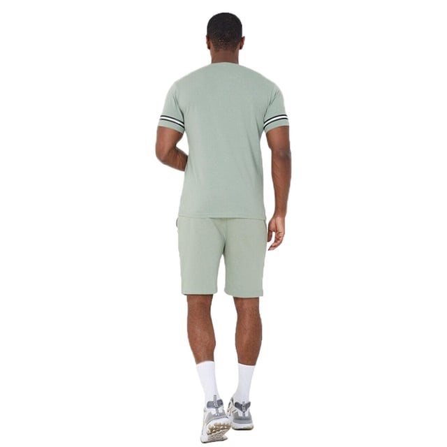 Get ready to embrace endless comfort and style this season with this t-shirt and shorts set from Brave Soul. Crafted from 100% cotton, the crew neck t-shirt features tape detail on the sleeves and embroidery detail on the chest. The matching shorts are made from a soft cotton blend and feature pintuck detail and two waist pockets. This set is the ultimate addition to your casual wardrobe. Model wears UK size M.