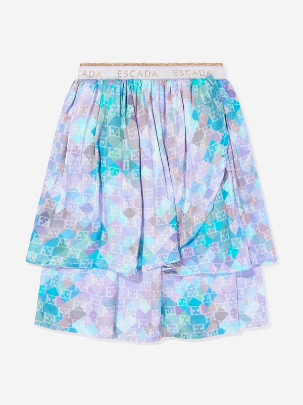 Introducing the luxurious Girls Layered Skirt in Blue by Escada ‚ the epitome of style and elegance for AW2024. Crafted with exquisite attention to detail, this skirt is an essential addition to any young fashionista's wardrobe: Exquisite Layered Design: Multiple layers create a beautiful, flowing silhouette that moves gracefully with every step. Vibrant Blue Hue: A rich, captivating blue tone that complements any outfit and stands out in any setting. Premium Materials: Constructed from the finest fabrics, ensuring durability and comfort for all-day wear.Enhance your girl's wardrobe with the sophisticated charm of the Escada Girls Layered Skirt in Blue. Perfect for special occasions or stylish everyday wear. Order now and elevate her style!