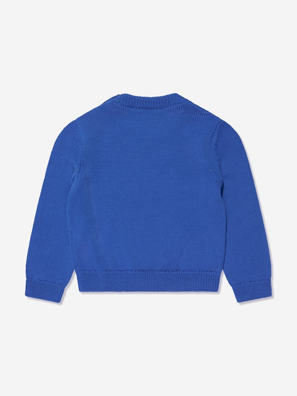 Versace's Italian portraits embody fine detailing and impeccable construction. This baby boys bright blue jumper captures the label's eccentric personality and passion for manipulating Greek abstracts into fashionable pieces. Made in pure virgin wool, it has been depicted with a subtle Medusa motif embroidery in the centre. Little ones will look effortlessly stylish and sophisticated.  Medusa Kids Embroidery Long Sleeves Shoulder Button Closure Elasticated Cuffs and Hem Outer Composition: 100% Pure Virgin Wool Embroidery: 100% Viscose Hand Wash Gently Using Mild Detergent Do Not Bleach Do Not Tumble Dry Dry Flat Cool Iron On Reverse With Damp Cloth On Top Do Not Dry Clean Wash Inside Out Do Not SoakVersace Size : Child's Height 0/3M: 22" / 56 cm 3/6M: 24.5" / 62 cm 6/9M: 27" / 68 cm 9/12M: 29" / 74 cm 12/18M: 31.5" / 80 cm 18/24M: 34" / 86 cm 2A: 36" / 92 cm 3A: 38.5" / 98 cm