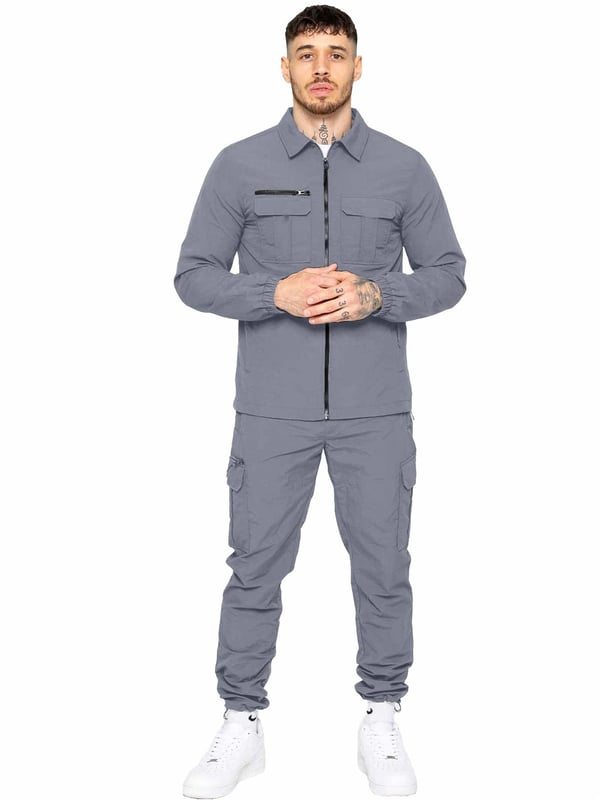 Expertly designed for outdoor activities and the transition to mid-season, this shirt jacket is constructed of crinkle nylon that is both water-repellent and wind-resistant. The fabric has a soft peach-fuzz feel and is complemented by a pointed collar, functional pockets, and a zip fastening to easily adjust the fit. The jacket is made with patch pockets and a flap on the chest, making it both functional and stylish.