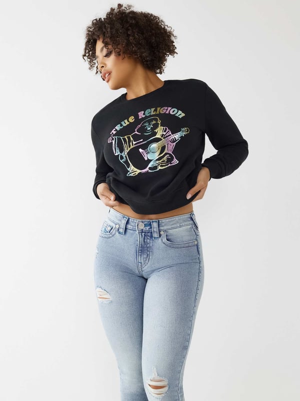 Keep it cute and comfy in the Buddha Crewneck Sweatshirt. Designed from a cozy cotton blend, this women's sweatshirt features a crewneck and multicolor shimmer Buddha graphic across the front.