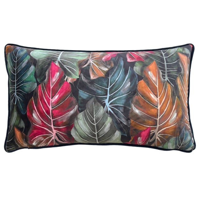 Add a touch of the tropics to your home furnishings with the Mogori Leaf cushion. Its printed luxury velvet front design features bright botanical leaves in various vivid colours, set on a contrasting background. Finished with a plain velvet reverse, contrast piped trim and a zip fastening.