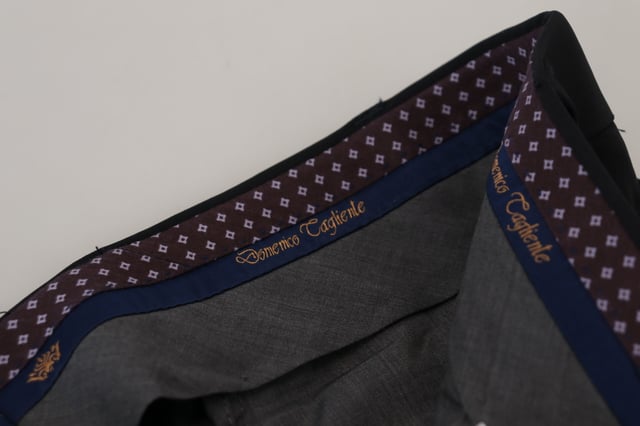 Brand: Domenico Tagliente\n
  Model: Dress pants\n
  Color: Black\n
  Material: 94% Polyester 6% Elastane\n
  Made in Italy\n
  Logo details
Material: 94% Polyester 6% Elastane