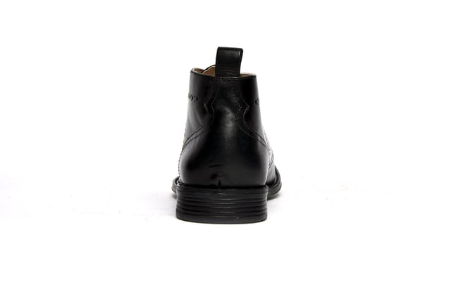 Combining brogue styling and a chukka boot silhouette with premium craftmanship, these Catesby England Belfry mens boots are a true must have, designed for a contemporary on-trend package. These Belfry mens brogue inspired chukka boots are the perfect match for your formal and casual wear. Crafted using a high-end leather upper, durable rubber outsole, and intricate stitch and hole-punch detailing, these boots are designed to impress.
 - Premium leather upper
 - Heel tab for easy on / off
 - 3 eyelet lace up fastening
 - Chukka boot silhouette
 - Soft textile lining
 - Brogue detailing
 - Durable rubber outsole 
 - Catesby England branding