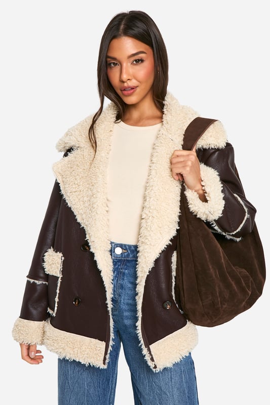 Wrap up in the latest coats and jackets and get out-there with your outerwearBreathe life into your new season layering with the latest coats and jackets from boohoo. Supersize your silhouette in a padded jacket, stick to sporty styling with a bomber, or protect yourself from the elements in a plastic raincoat. For a more luxe layering piece, faux fur coats come in fondant shades and longline duster coats give your look an androgynous edge.