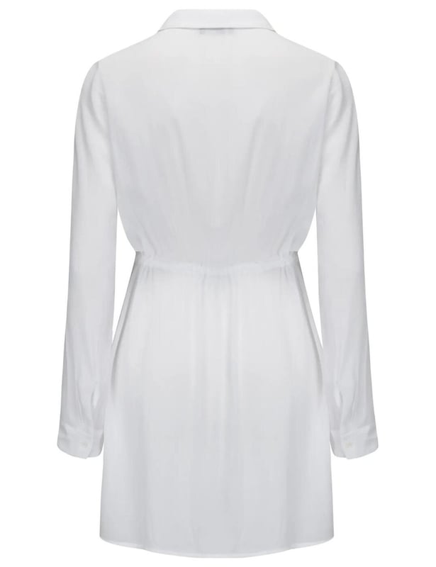 Get ready to enjoy the sun, sea and sands with Pour Moi's crinkle button beach shirt. This stylish and adjustable shirt dress is perfect for soaking up some sun in style this season. Crafted from crinkle fabric, it has a button-through shirt design with gold-tone hardware detail on the waist ties for an added flair. Whether you're headed to the beach, brunch or dinner, this bohemian and chic dress is sure to make a statement! Its adjustable waist ties ensure a perfect fit while its lightweight fabric makes it ideal for summer days.  Shirt dress, Crinkle fabric, Button-down shirt, Adjustable waist tie, Mini-dress style, Gold hardware detail on waist ties, Country of origin: China, Composition: 55% Recycled Polyester | 45% Polyester, Listed in UK sizes.   Cover Up