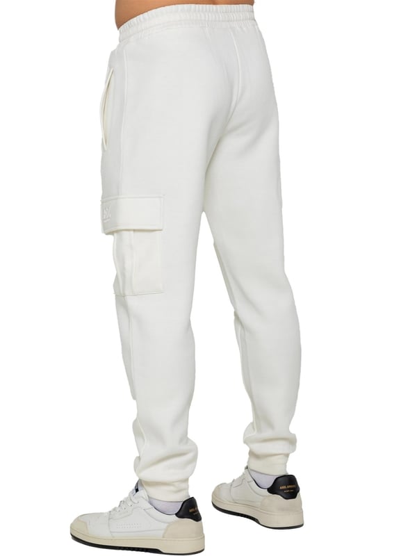 Experience superior comfort and style with Enzo Men's Regular Fit Cargo Joggers! Crafted with a brushed back inner fleece lining, these joggers are designed to keep you cozy all day long. Perfect for casual wear, they feature convenient 2 side slash pockets and 2 cargo pockets, providing ample storage space for your essentials. Stay on-trend with the cuffed leg design, offering a modern silhouette and added comfort.