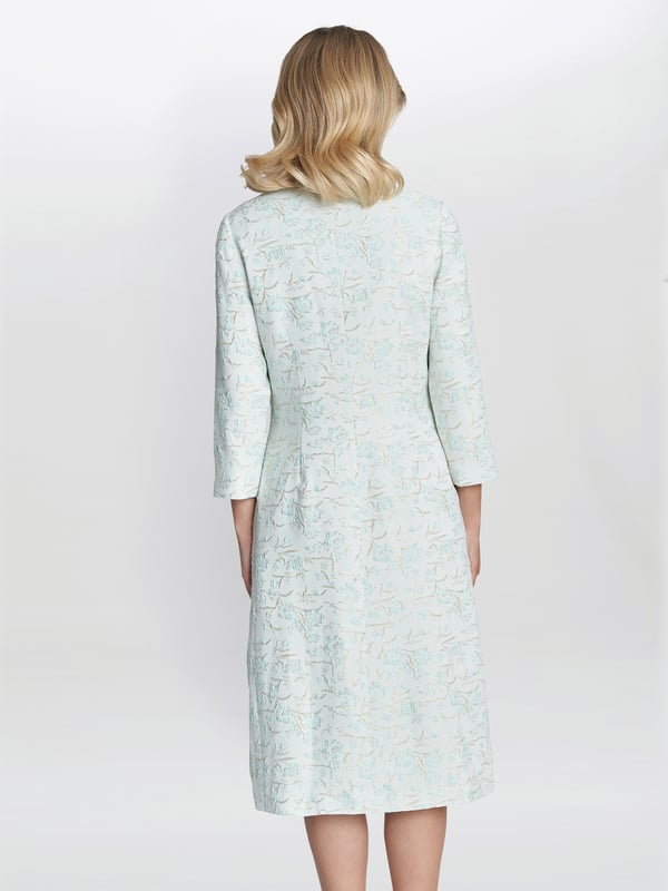 Feel prim and proper in the sophisticated stretch jacquard dress and jacket by Gina Bacconi. The dress features concealed back zip fastening and is fully lined. This stunning ensemble is perfect for any event. Fashioned from luxury floral stretch jacquard material, perfect for the mother of the bride.