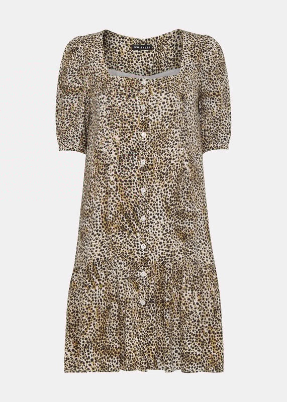 Experience elegance with the Ink Spot Midi Dress - perfect for any special occasion.