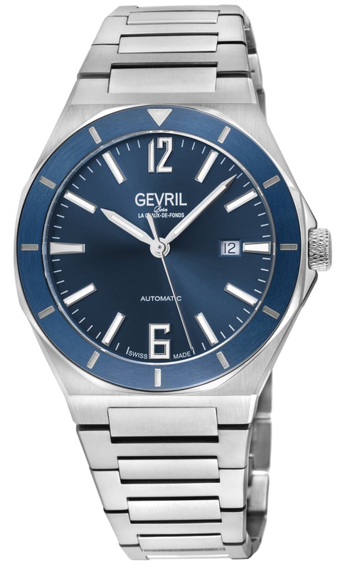 Like a moment of solitude amongst the chaos, Gevril’s High Line Collection is an automatic timepiece with historical roots and sound modern design. Named after Manhattan’s historical High Line park – a nearly 1.5 mile elevated sanctuary of greenery built on a historic steel railway – this collection inspires the cool, calm and collected feel of a walk in the park.   With clean lines and an expert use of space, the High Line collection features Swiss automatic movement encased by 43mm of pure stainless steel. The unencumbered watch face in Forest Green, Navy, Black, Brown or Silver implies that simplicity well constructed is not to be underestimated. The sunray dial, an ode to the outdoor greenway, and a dark colored bezel reminiscent of the original West Side railway add solid touches to structural integrity. Numbers 6 and 12 on the dial denote the middle and end of the path while the date viewing window at 3 evokes memories of overlooking 10th Avenue.   A modern take with historical references, this collection is elevated and understated – if relaxed and sharp were a watch, the High Line would be it. Because architecture doesn’t have to be complicated to be monumental: the High Line collection. 
Gevril 48401B Men's High Line Swiss Automatic Watch
Gevril Men's Automatic Watch from the High Line Collection
43mm Round 316L Stainless Steel Case, Blue Bezel, Blue Sunray Dial
Push/Pull Crown, Date at 6:00
Exhibition Case back
316L Stainless Steel Bracelet with Deployment Buckle
Anti-reflective Sapphire Crystal
Water Resistant to 100 Meters/10ATM
Swiss Automatic, SW200 Movement