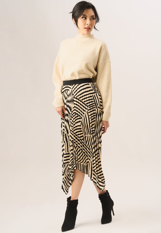 This Beige Asymmetric Hem Pleated Midi Skirt is perfect for any special occasion. It features a high-quality pleated construction that moves gracefully with your body while delivering a contemporary, asymmetric hemline. This skirt is sure to make a statement.