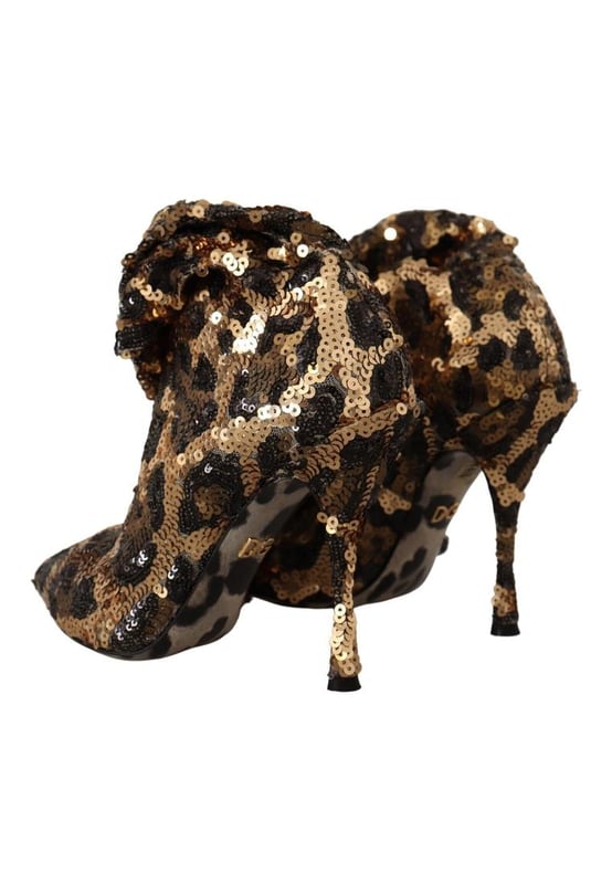 Gorgeous Dolce & Gabbana Knee High Boots with Leopard Pattern Sequins
  Brand new with tags
  Color: Gold brown leopard pattern
  Material: 70% Polyester 28% Nylon 2% Elastane
  Sole: Leather
  Logo details
  Very Quality and comfort
  Made in Italy
Material: 70% Polyester 28% Nylon 2% Elastane