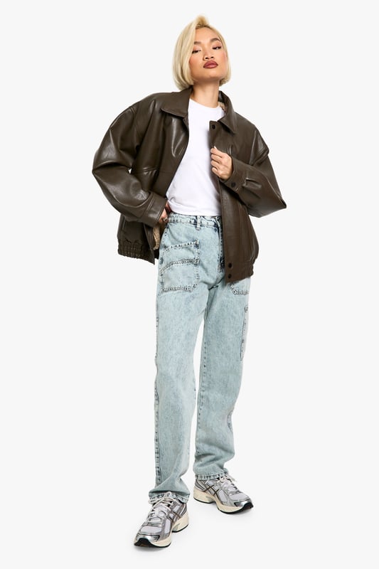 Trendy acid wash finish for a vintage-inspired look
        Straight fit design for a comfortable, relaxed silhouette
        Multiple cargo pockets for added functionality
        High-rise waist for a flattering fit
        Durable cotton construction for long-lasting wear
    
    Make a bold statement with these Acid Wash Cargo Straight Fit Jeans from Boohoo. Perfect for the fashion-forward woman who loves to blend comfort with style, these jeans offer a unique twist on a classic wardrobe staple. The straight fit provides a relaxed silhouette that's ideal for casual outings, while the acid wash finish adds an edgy, vintage-inspired touch. Style these jeans with a crisp white tee and an oversized leather jacket for an effortlessly cool look. Pair with trainers for a day of running errands, or dress them up with ankle boots for a night out with friends. These versatile jeans are a must-have for your casual wardrobe, offering endless styling possibilities for various informal occasions.