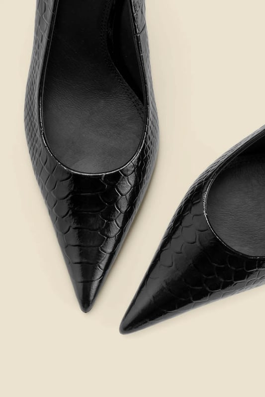 Every wardrobe needs a pairFinished in luxe croc leatherSleek pointed toe silhouette You'll love the statement curved heel Effortlessly chic with 9-5 tailoring Complete your 'jeans and a nice top' combo