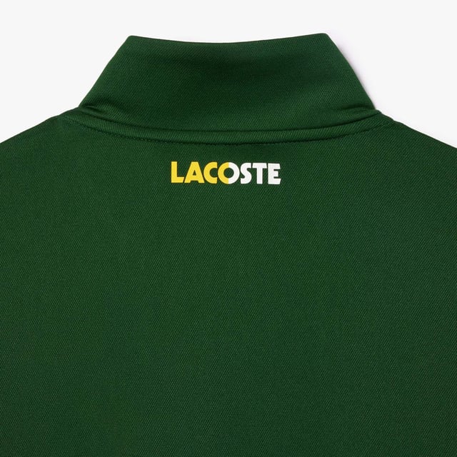 Designed for Tennis  for a regular frequency of use This product is in Interlock which guarantees you a resistant fabric making it adapted to high repetitive movements during training sessions. This sweatshirt is made in 100% recycled polyester and has 2 zipped hand pockets to secure your personal items. Classic fit: comfortable ease on body  with comfortable sleeves The technical capsule offers the complete seasonal wardrobe on and off court with a strong design identity. LACOSTE wording print at back neckline.