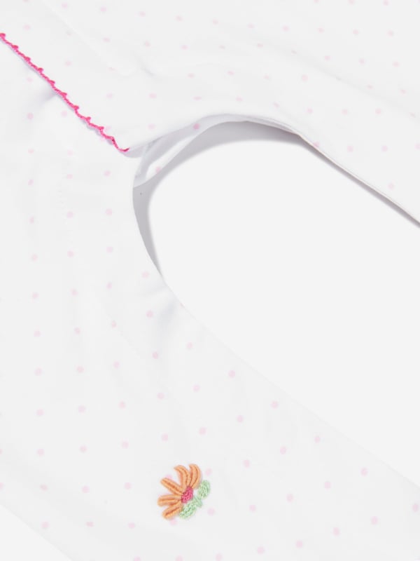 Magnolia Baby depict soft sophistication into their refined products. This baby girls pink babygrow ruffle footie design is reflective of the label's precision of beauty and intricate focus. Made in Pima cotton with ruffled trims, polka dot patterning and embroidered floral detailing. She will look and feel divine. Crew Neck  Brand Tag Polka Dot Patterning  Press Stud Fastening Long Sleeves  Ruffled Trims Pima Cotton  Embroidered Floral Detailing
