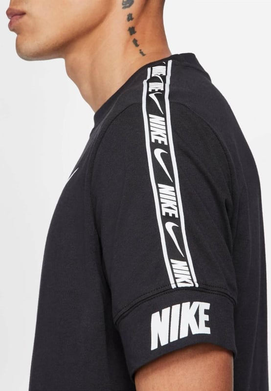 Nike Mens Repeat T Shirt.    Ribbed Crew Neck, Short Sleeve.     Soft Jersey Cotton Provides Lasting Comfort and Durability.     Repeat the Swoosh Graphics and Block Lettering So You Can Show the Love of Nike.