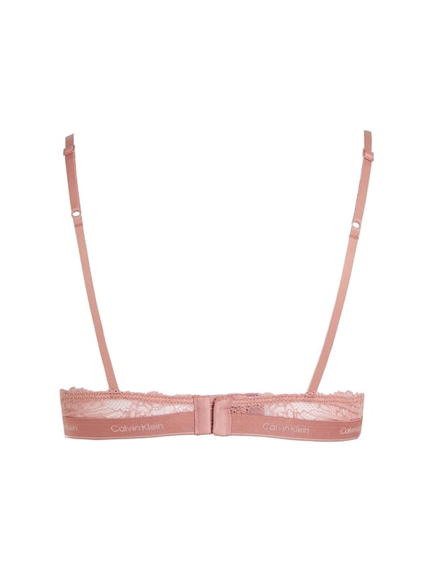 Calvin Klein Modern Lace Lined Triangle Bra Revolutionize your lingerie collection with the Calvin Klein Modern Lace triangle bra. Designed with a plunging neckline, this triangle bra is perfect for wearing under low-cut tops and dresses. The gorgeous lace cups add a touch of sophistication and femininity, making you feel truly fashionable. But that's not all – this bra is wireless and not padded for maximum comfort, giving you the freedom to move without any uncomfortable underwire digging into your skin. The moulded cups provide just the right amount of shaping and support, giving you a beautiful silhouette. And of course, it wouldn't be a Calvin Klein product without the signature waistband, adding a touch of designer to your underwear drawer. Adjustable shoulder straps ensure the perfect fit for your body, while the convenient hook and eye closure allows for easy wearing and removal. And let's not forget about the matching coordinates available, so you can complete your dream lingerie set.
Triangle bra
Plunging neckline
Gorgeous lace cups
Wireless for comfort
Non-padded
Moulded for shaping
Calvin Klein signature waistband
Adjustable shoulder straps
Hook and eye closure
Matching coordinates available
Country of origin: Indonesia
Composition: 80% Nylon | 20% Elastane
Listed in UK sizes
Non-Wired Bra